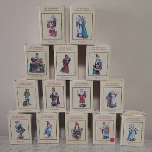 Retired- Set Of 14 International Santa Claus Figurine Collection